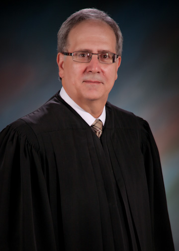 Hon. Kim Tesla